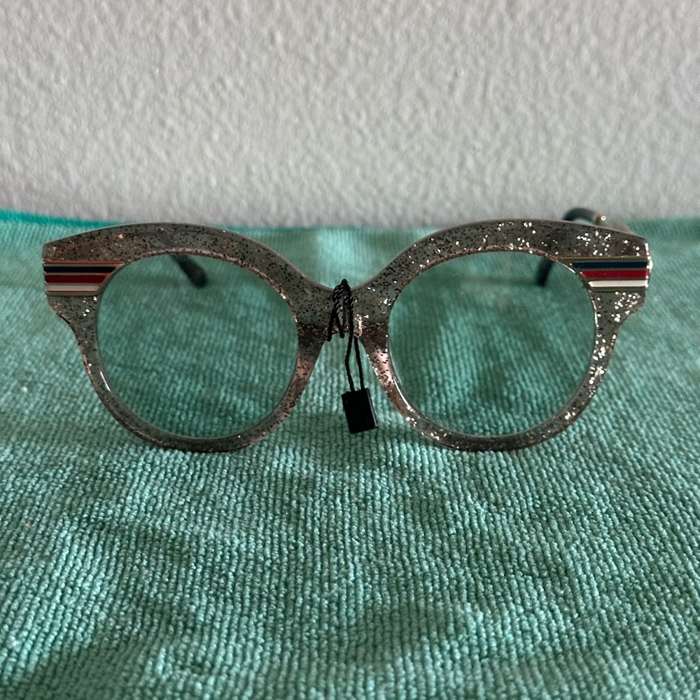 Gucci round glitter frame glasses acetate